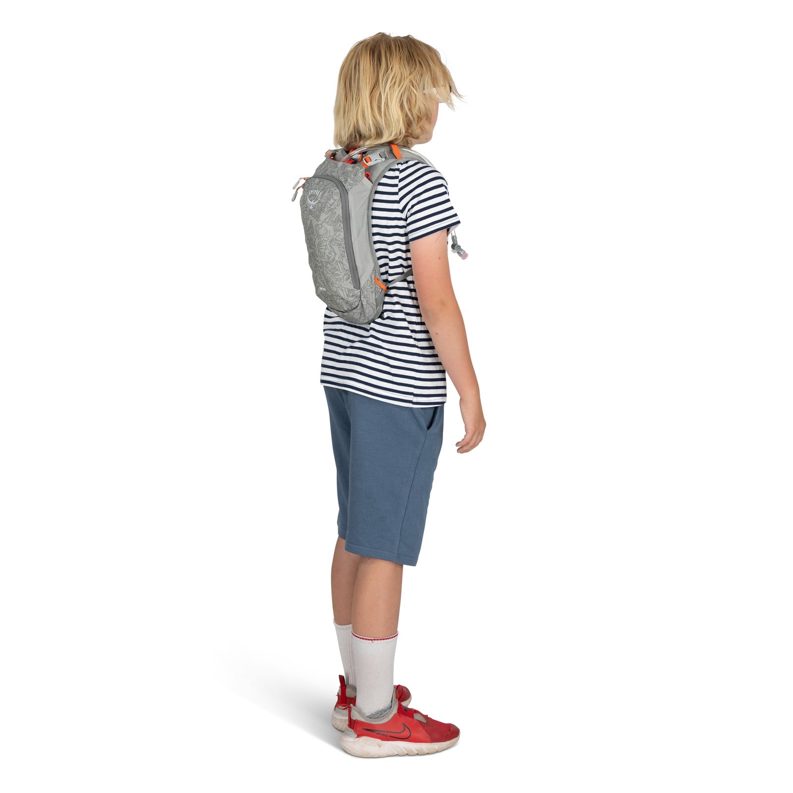 Osprey Moki 3 Kids Hydration Backpack 3L in Hungry Dino Print — lifestyle 2