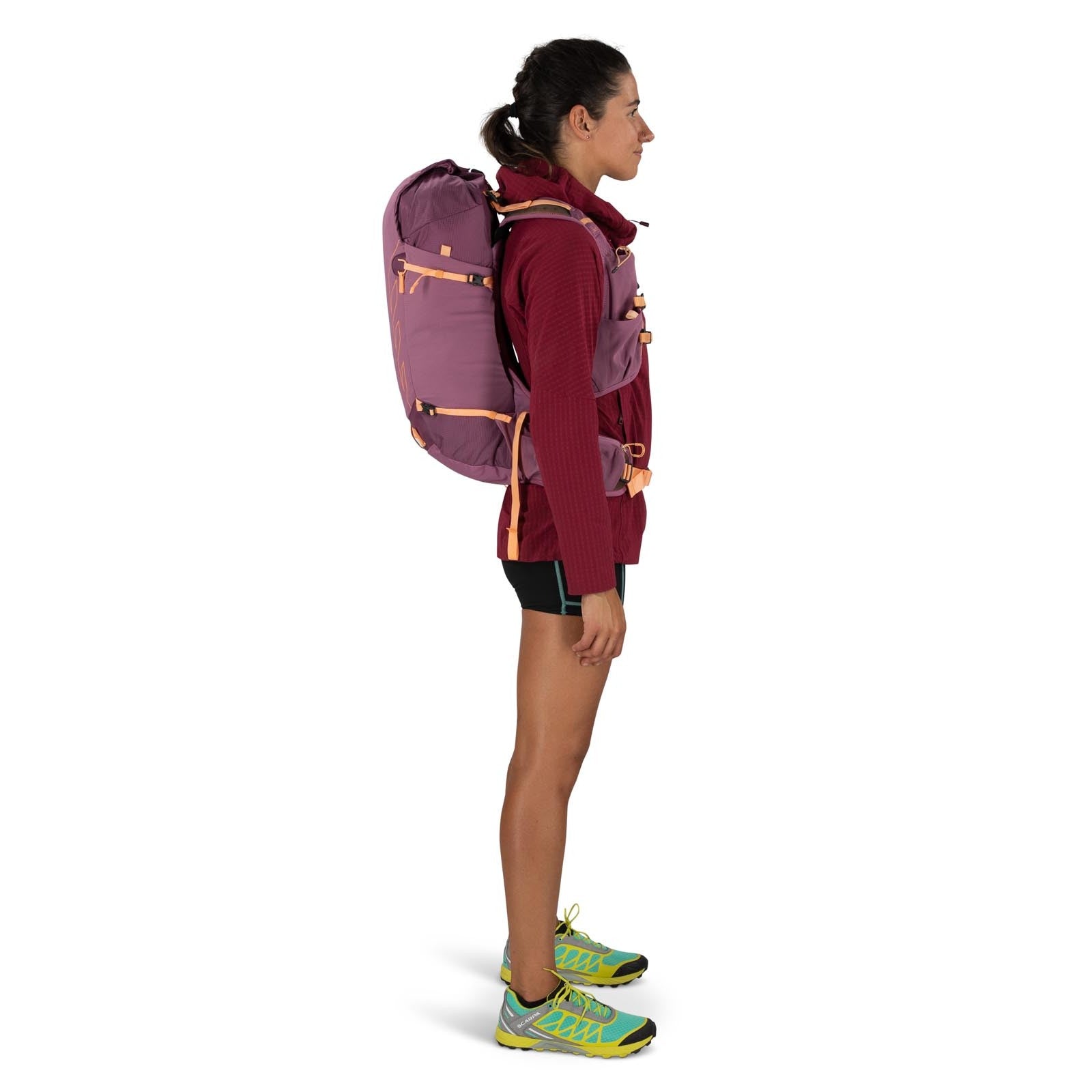 Osprey Tempest Velocity 20 Hiking Backpack 20L in Pashmina Melon — lifestyle 2