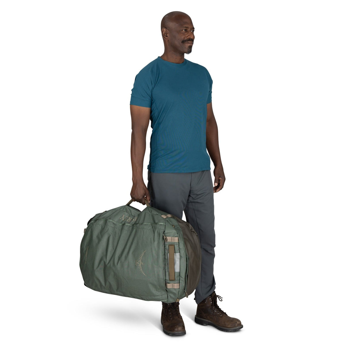 Osprey Transporter 95L Expedition Duffel in Pine Leaf/Earl Grey — lifestyle