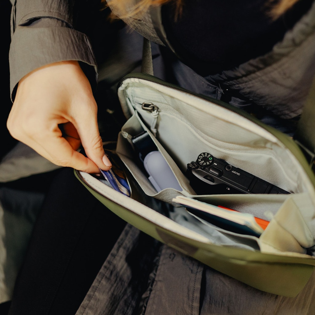 Peak Design Travel Crossbody 3L in Sage — lifestyle 2