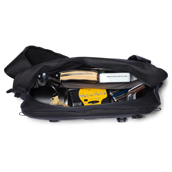 Chrome Industries Kadet WP 9L sling bag – black colorway, open showing the interior