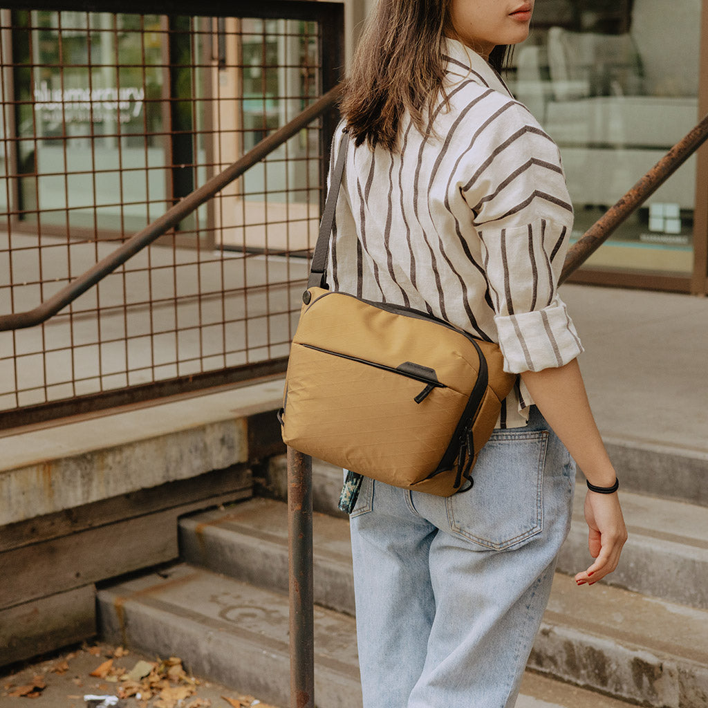 Peak Design Everyday Sling 6L in Coyote — lifestyle 2
