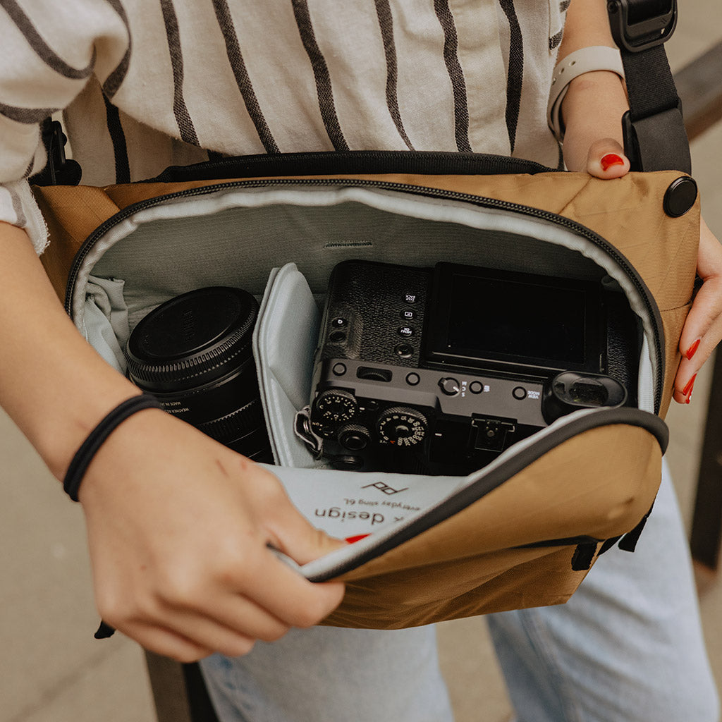 Peak Design Everyday Sling 6L in Coyote — lifestyle 3