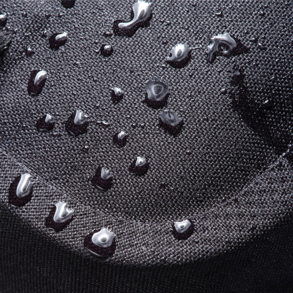 Chrome Industries Mini Kadet WP 5L sling bag – close-up of water droplets on the waterproof exterior