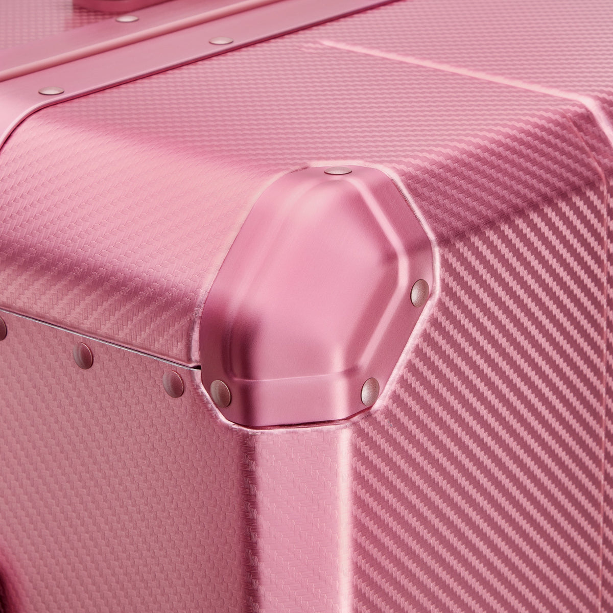 Delsey Alu'r Aluminum Large Spinner Upright in Pink — detail view 6 # color_Pink