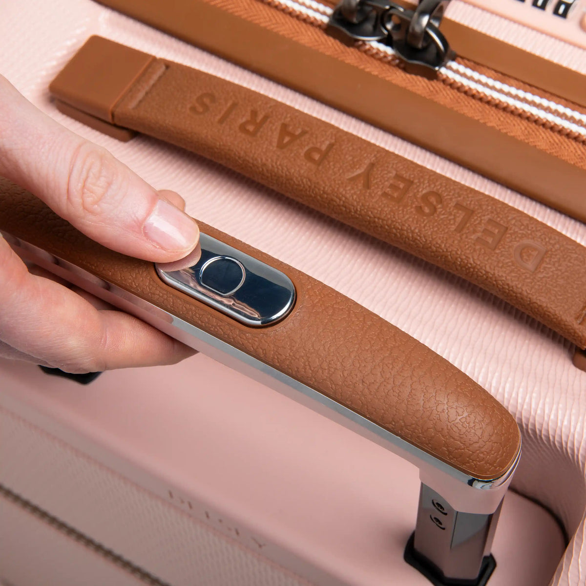 Delsey Chatelet Air 2.0 23-Inch Carry-On Spinner in Blush Pink — lifestyle