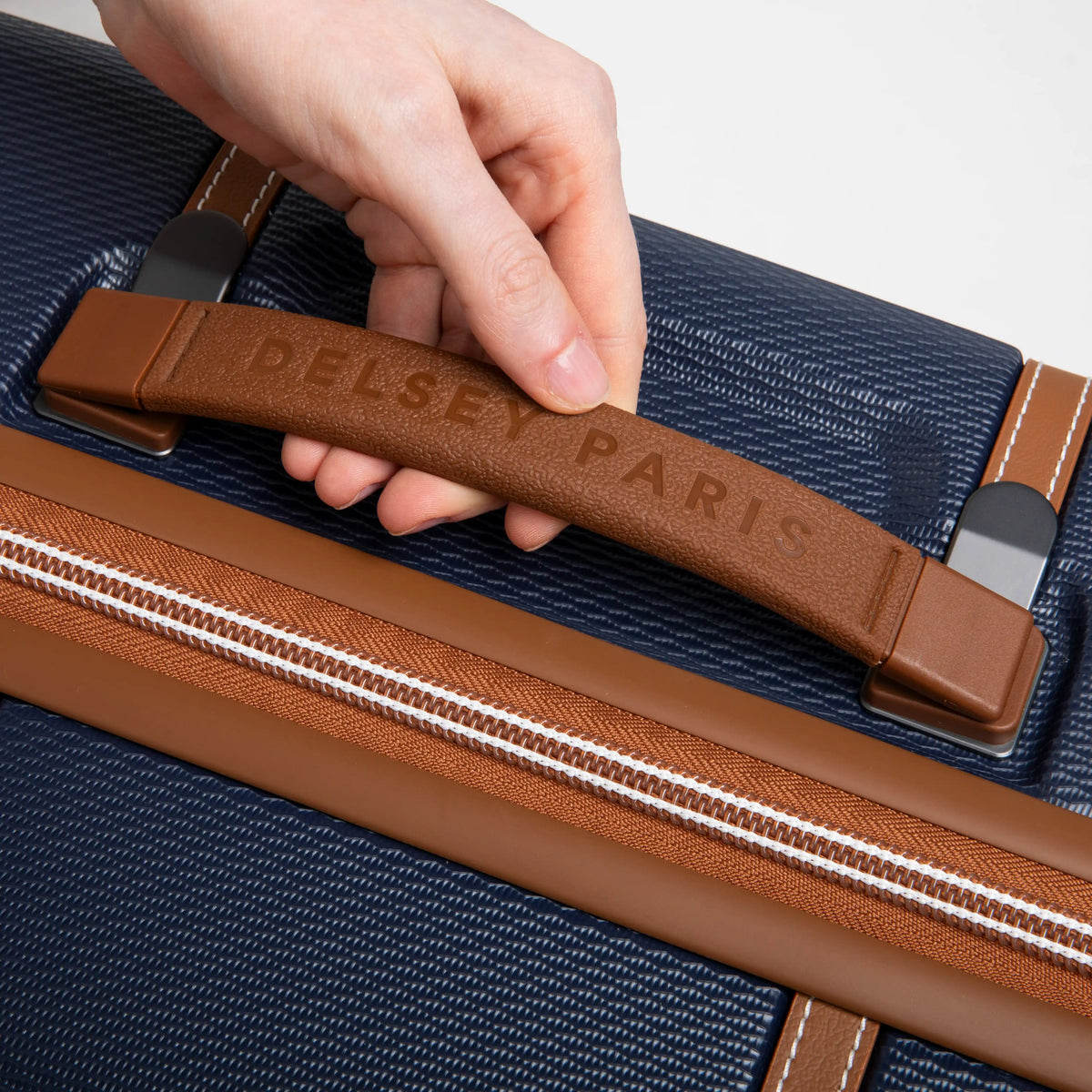Delsey Chatelet Air 2.0 23-Inch Carry-On Spinner in Navy — lifestyle 4