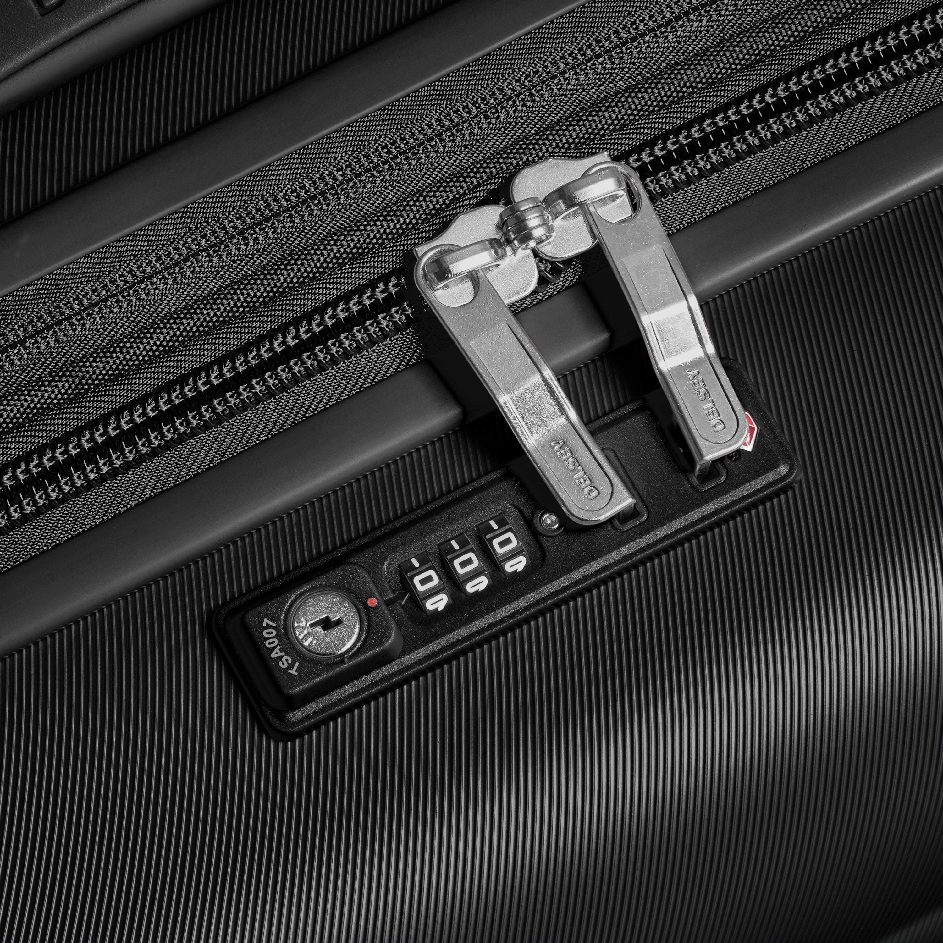 Delsey Cruise 3.0 Medium Expandable Spinner in Black — back view # color_Black