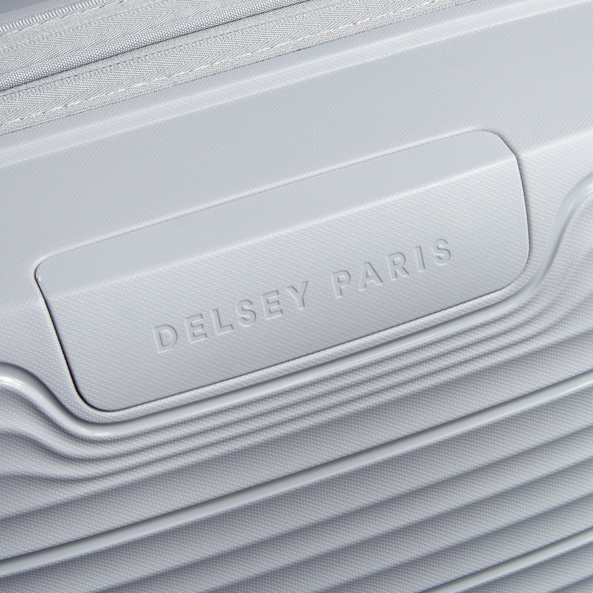 Delsey Dune Medium Expandable Spinner in Lunar Rock — detail view 4