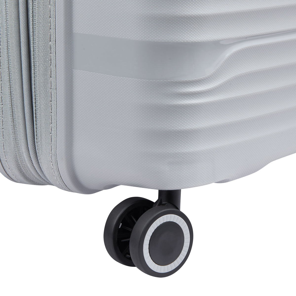 Delsey Dune Medium Expandable Spinner in Lunar Rock — detail view 3