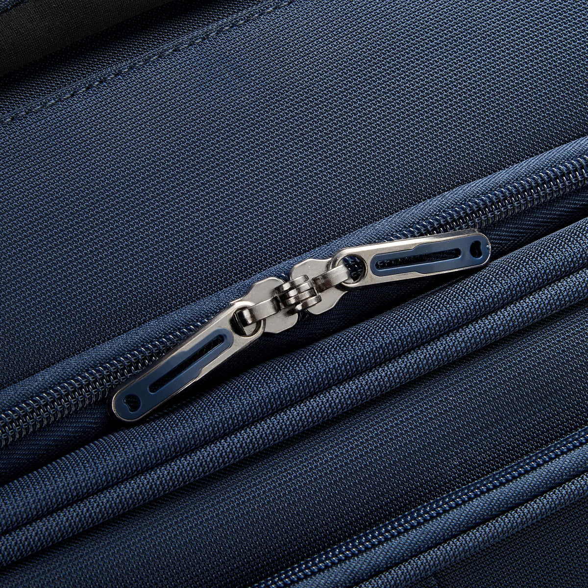 Delsey Helium DLX Carry-On Plus Expandable Spinner in Navy — detail view 2 # color_Navy