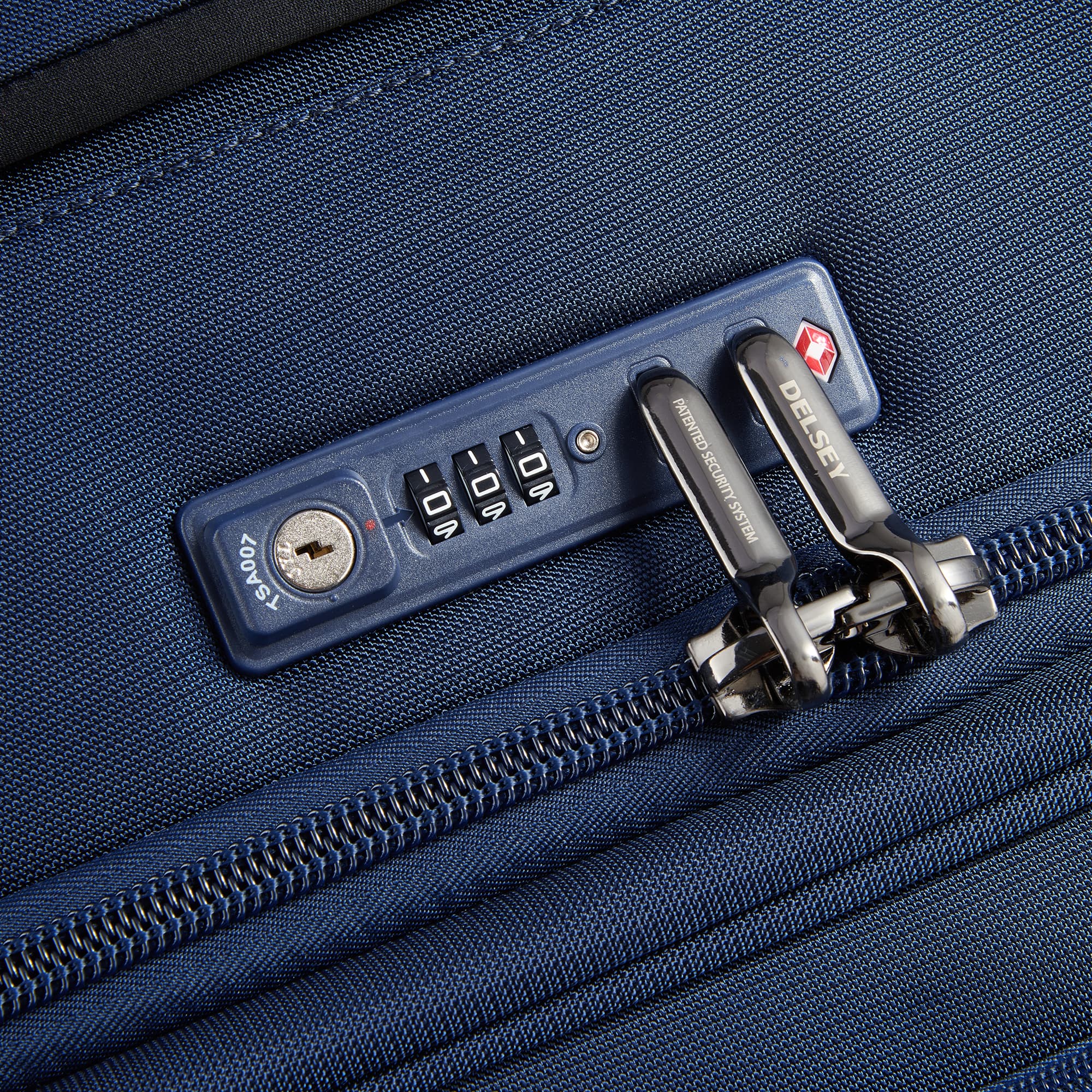 Delsey Helium DLX Medium Expandable Spinner in Navy — detail view 2 # color_Navy