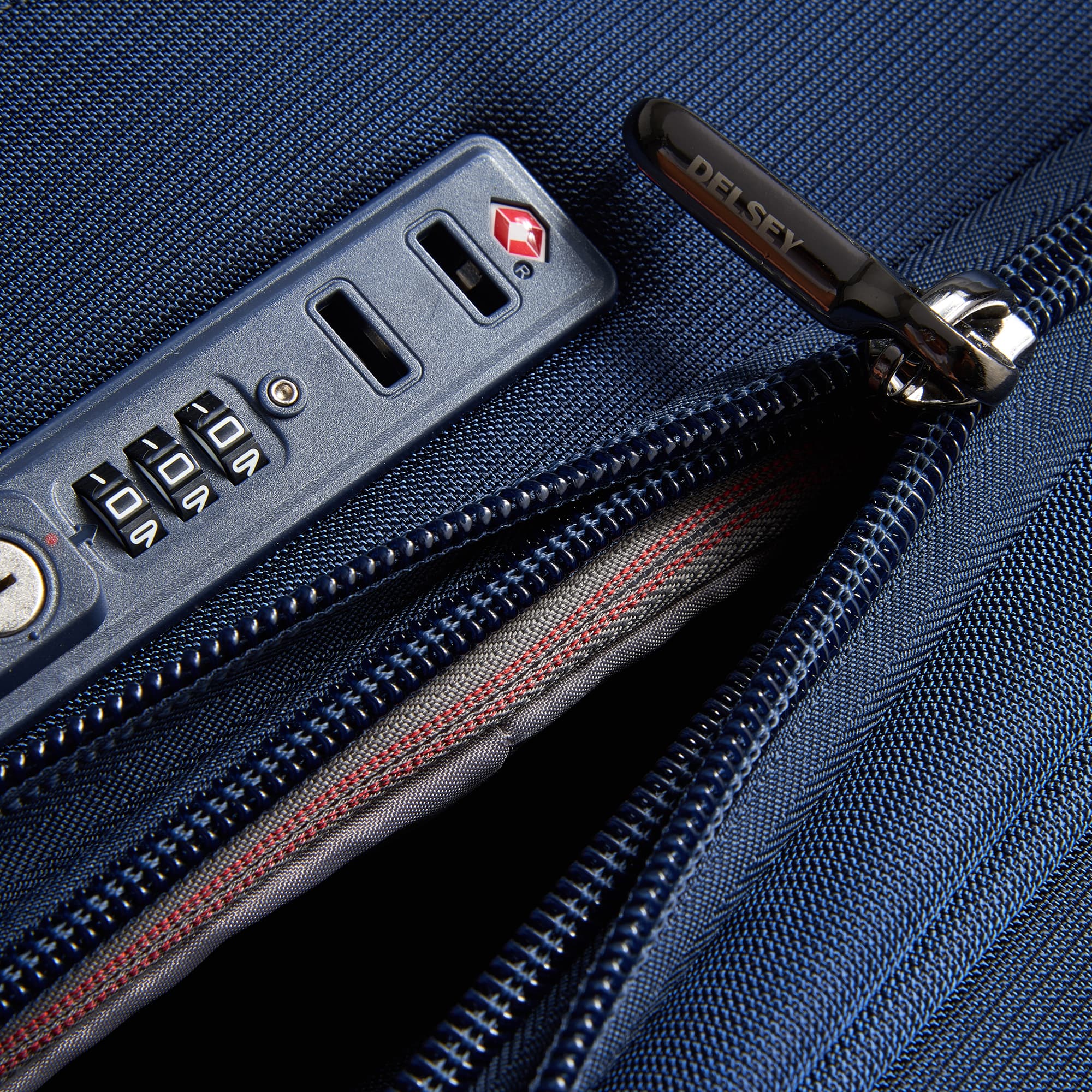 Delsey Helium DLX Medium Expandable Spinner in Navy — detail view 3 # color_Navy