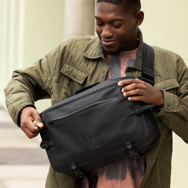 Chrome Industries Kadet Max WP 15L sling bag – person wearing the sling bag across the body