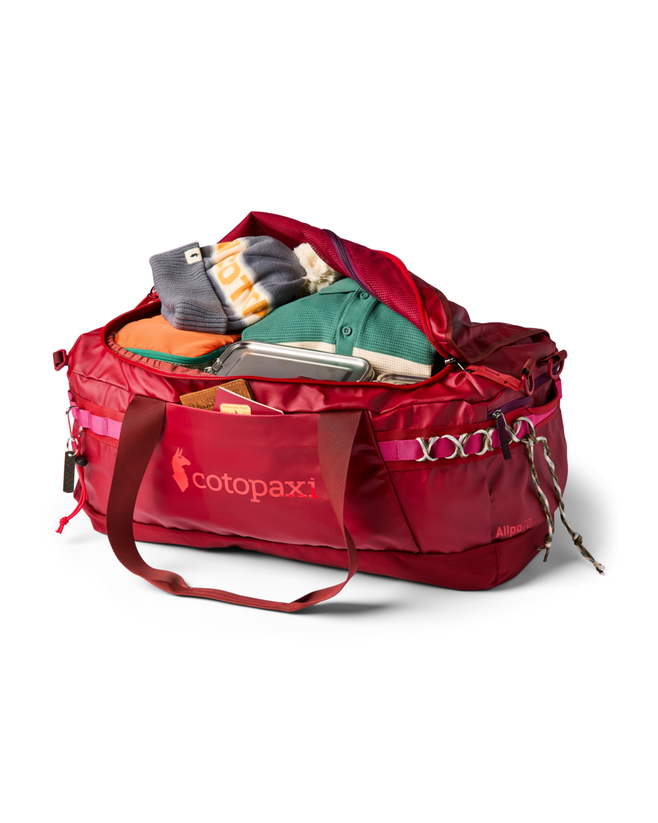 Cotopaxi Allpa Getaway 70L Duffel in Crimson — lifestyle