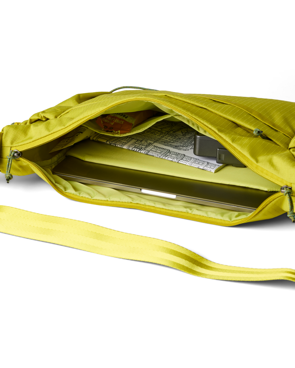 Cotopaxi Viaje 12L Shoulder Bag in Citron — detail view