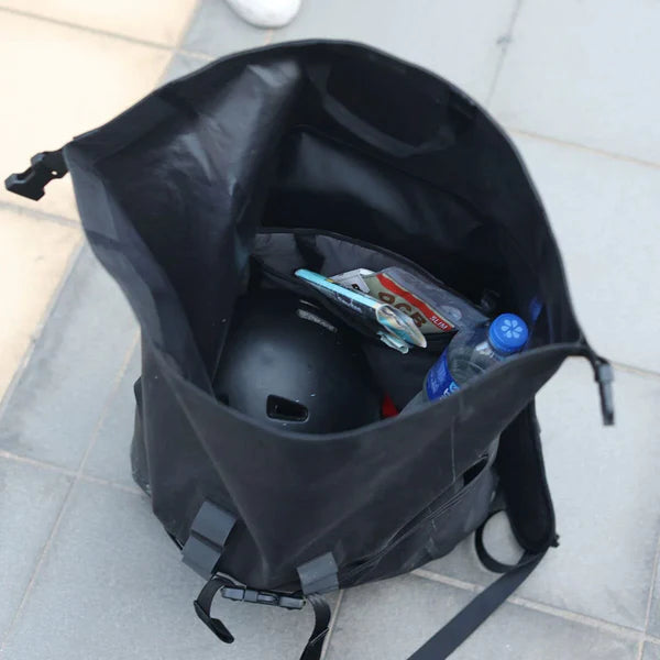 Chrome Industries Urban Ex Rolltop 30L backpack – black, rolltop rolled open showing interior
