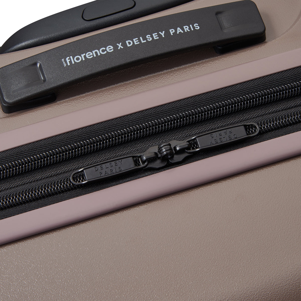 Delsey Catch Flights Carry-On Plus Expandable Spinner in Chestnut — detail view