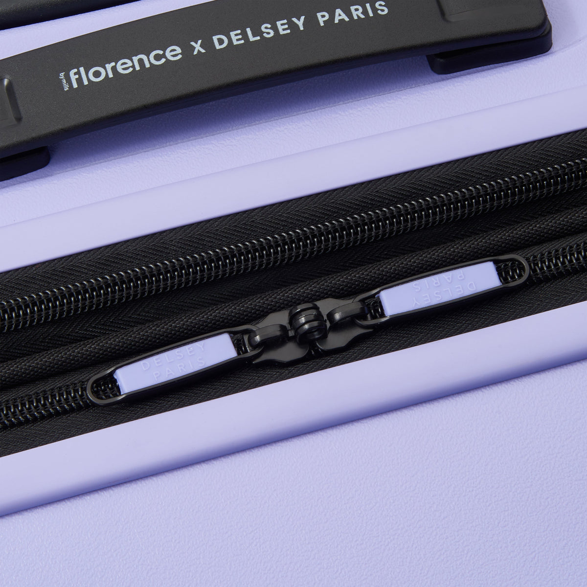 Delsey Catch Flights Medium Expandable Spinner in Lavender — detail view