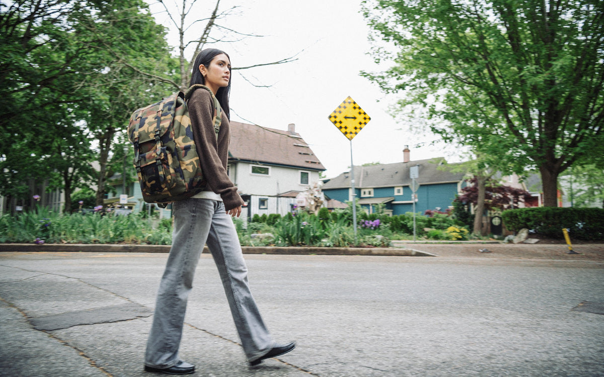 Herschel Little America Backpack 30L in Woodland Camo/Black Label — lifestyle
