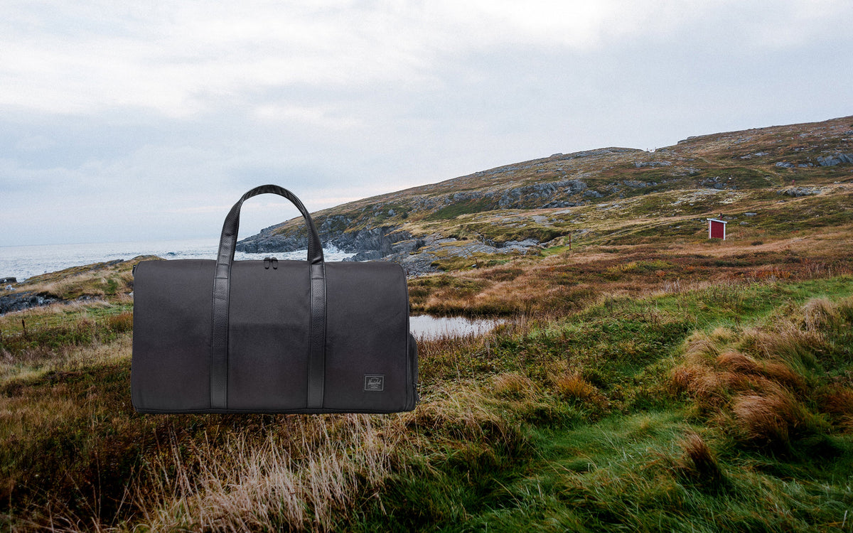 Herschel Novel Duffle 43L in Black Tonal — lifestyle