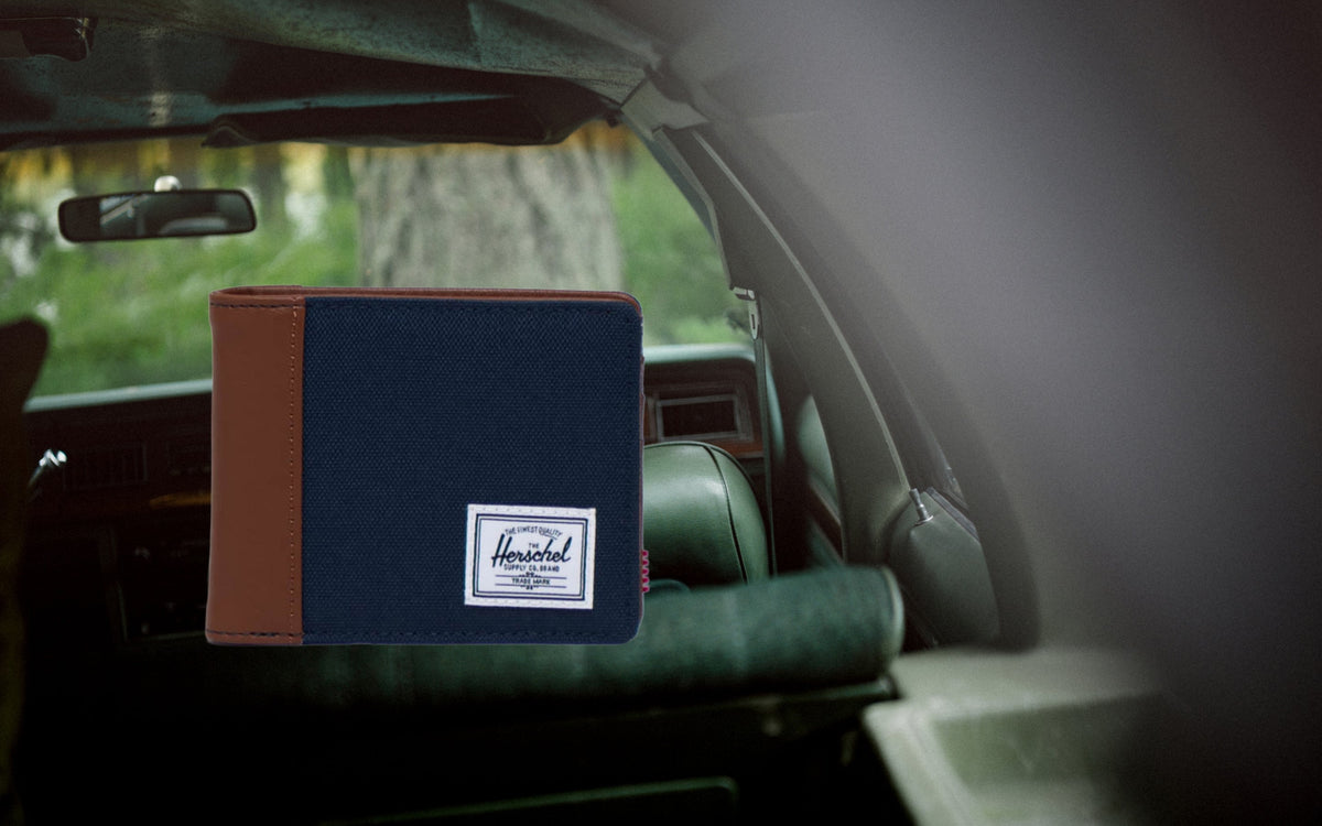 Herschel Hank Wallet RFID in Navy/Tan — lifestyle