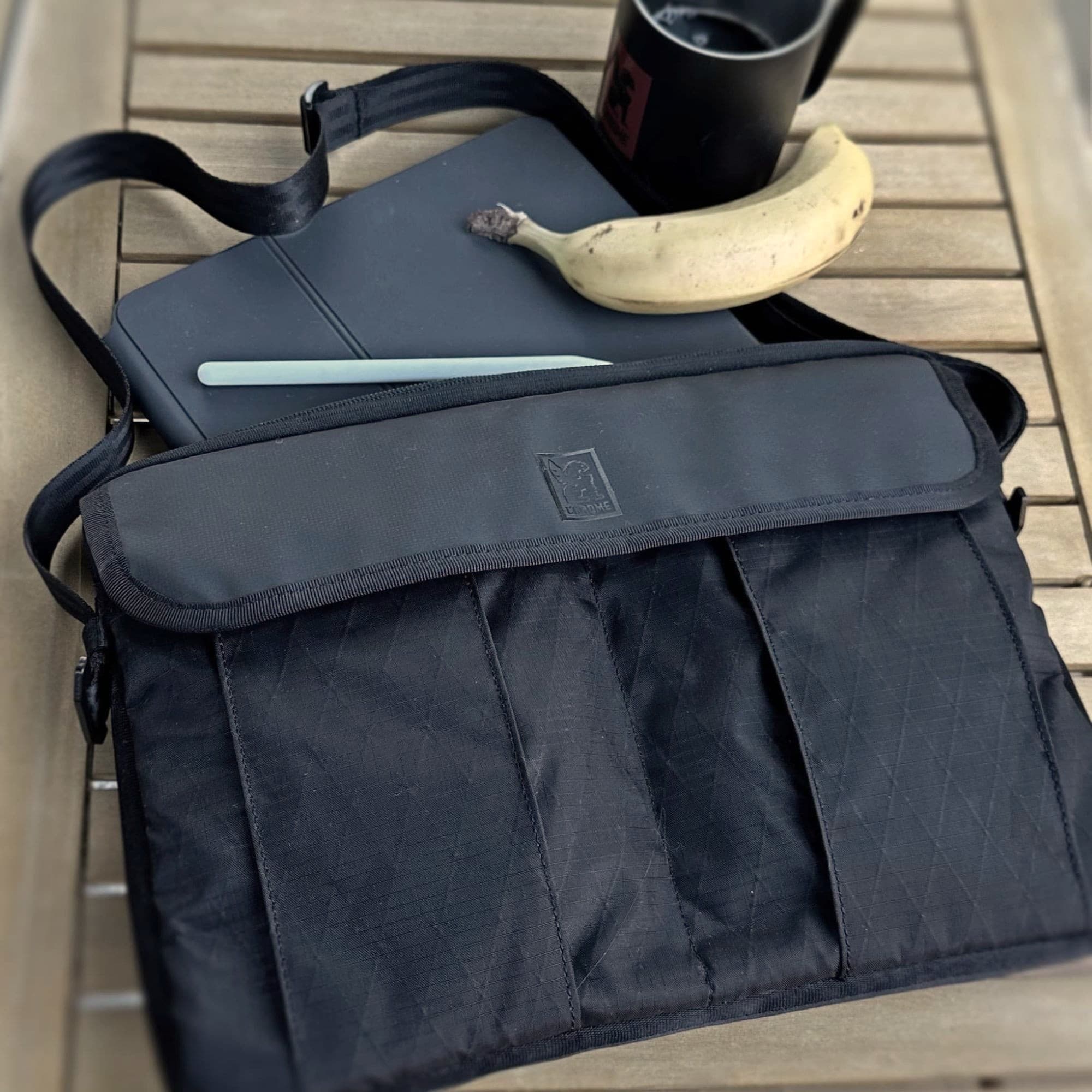 Chrome Industries Laptop Sleeve in Black X — lifestyle