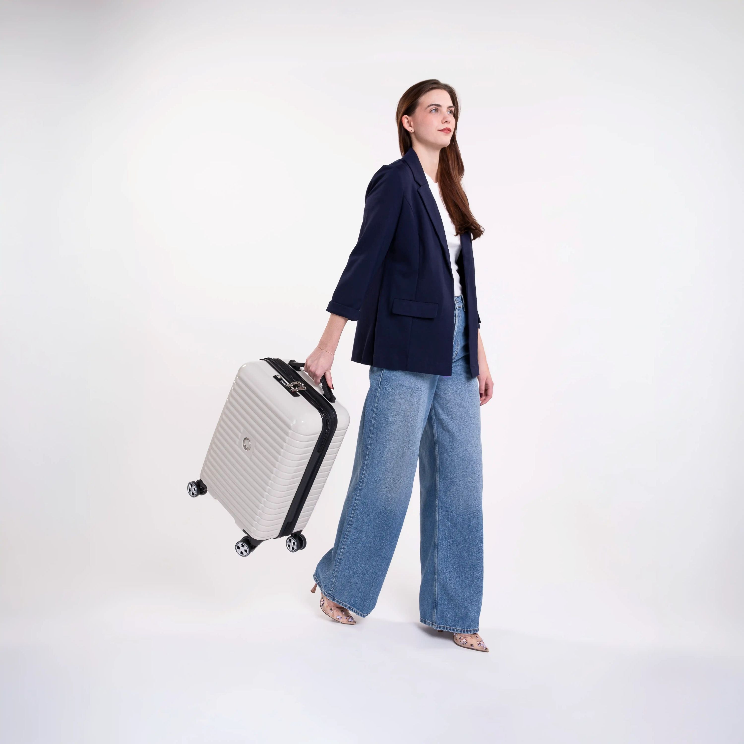 Delsey Cruise 3.0 Carry-On Plus Expandable Spinner in Ivory — lifestyle # color_Ivory