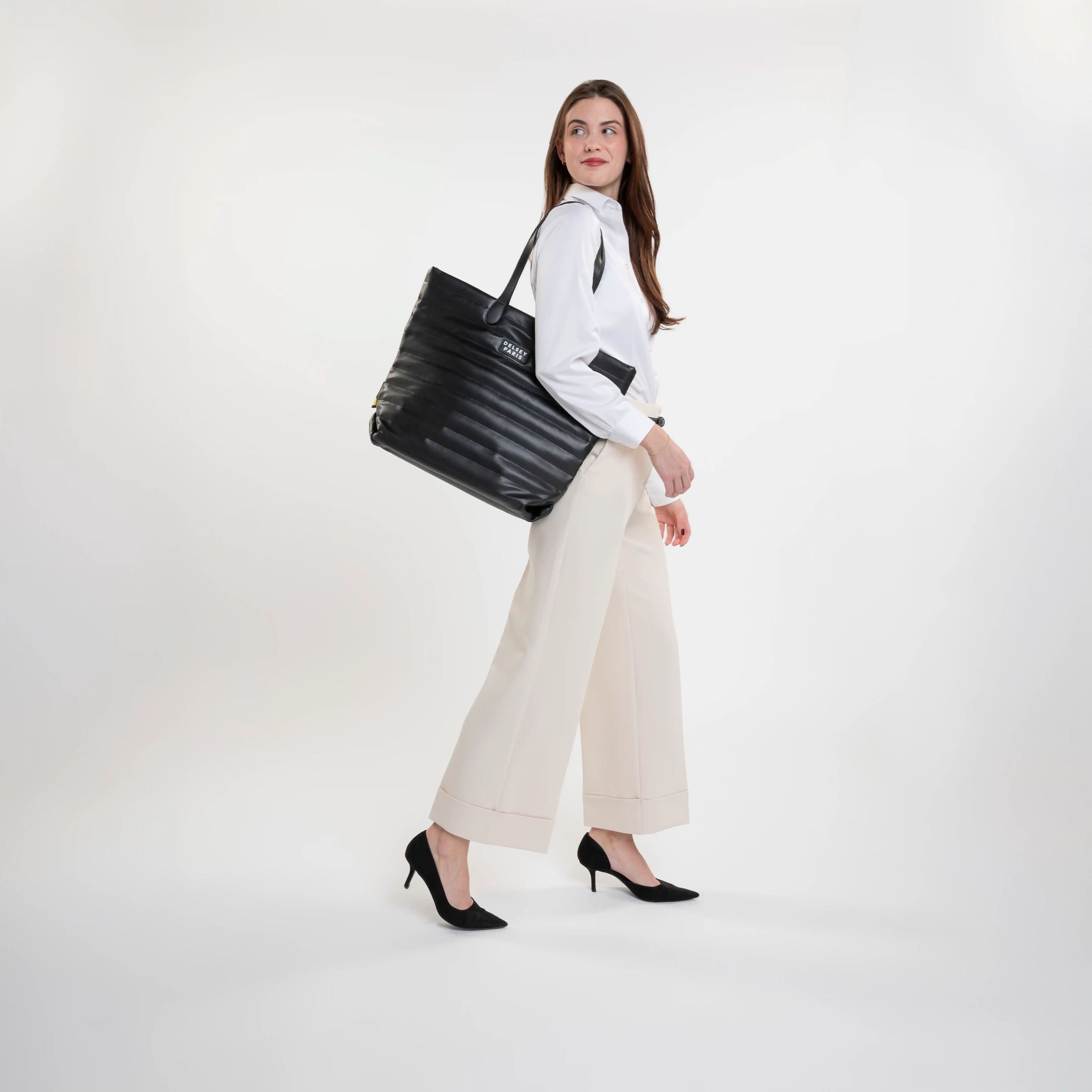 Delsey Cruise 3.0 Softside Tote Travel Bag with Laptop Pocket in Black — lifestyle # color_Black