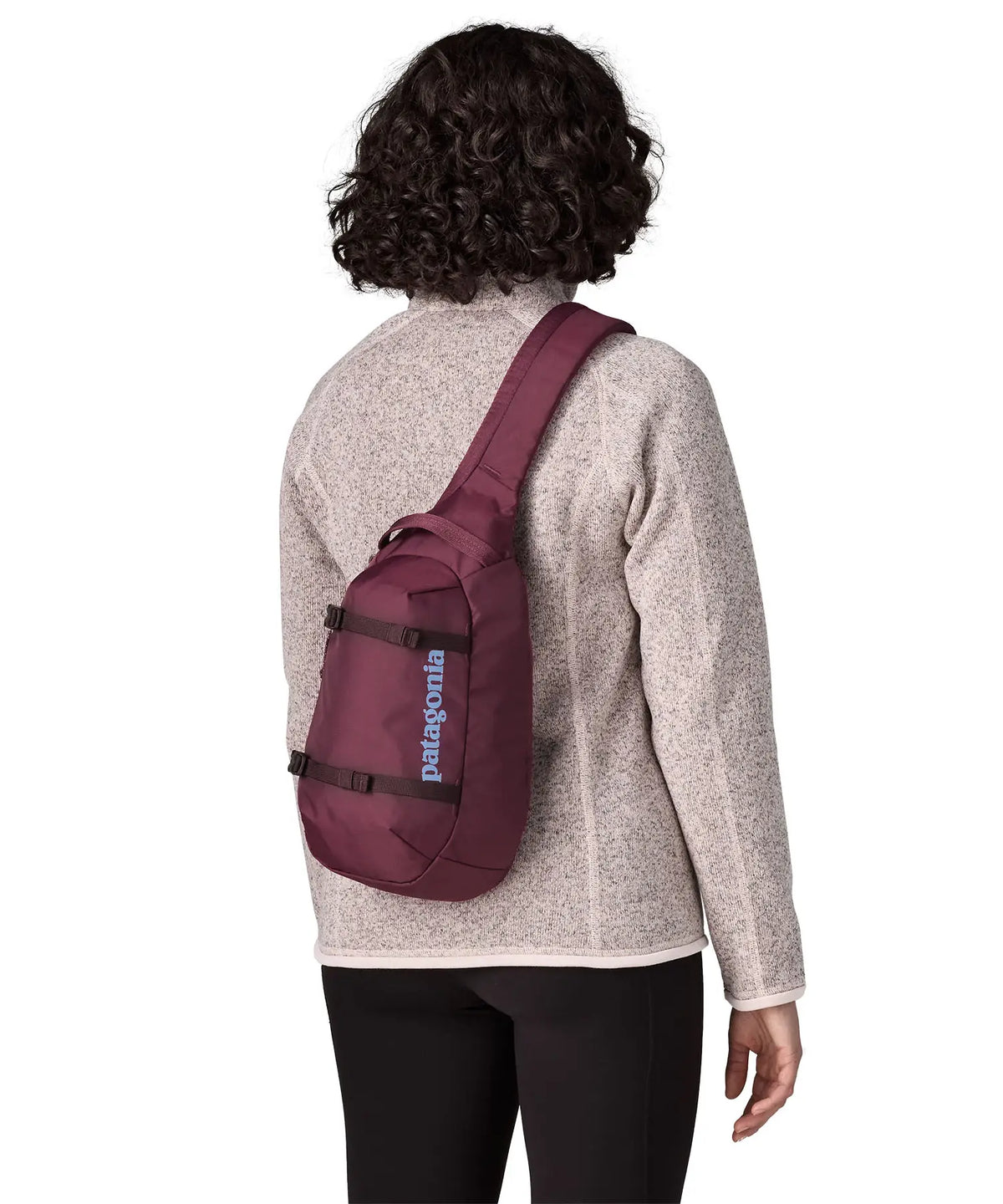 Patagonia Atom Sling Bag 8L in Berry Fig — lifestyle