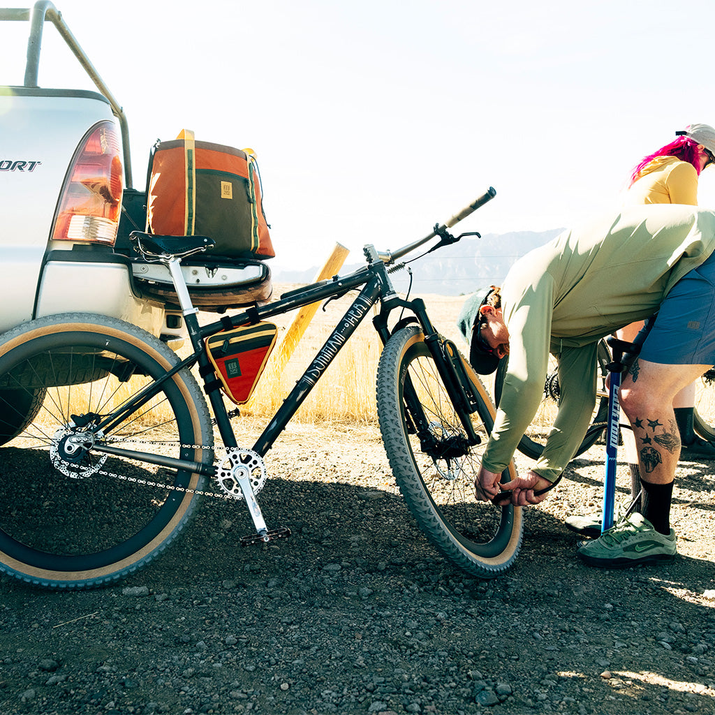 Topo Designs Bike Frame Bag in Woodland Terracotta — lifestyle 2 # color_Woodland Terracotta