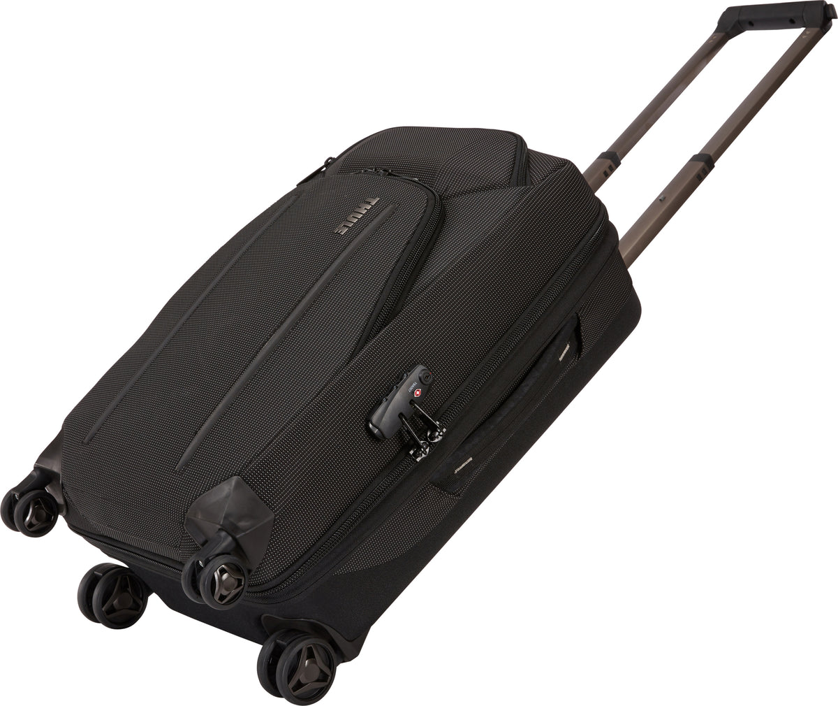 Thule Crossover 2 Carry On Spinner in Black — angle view 3