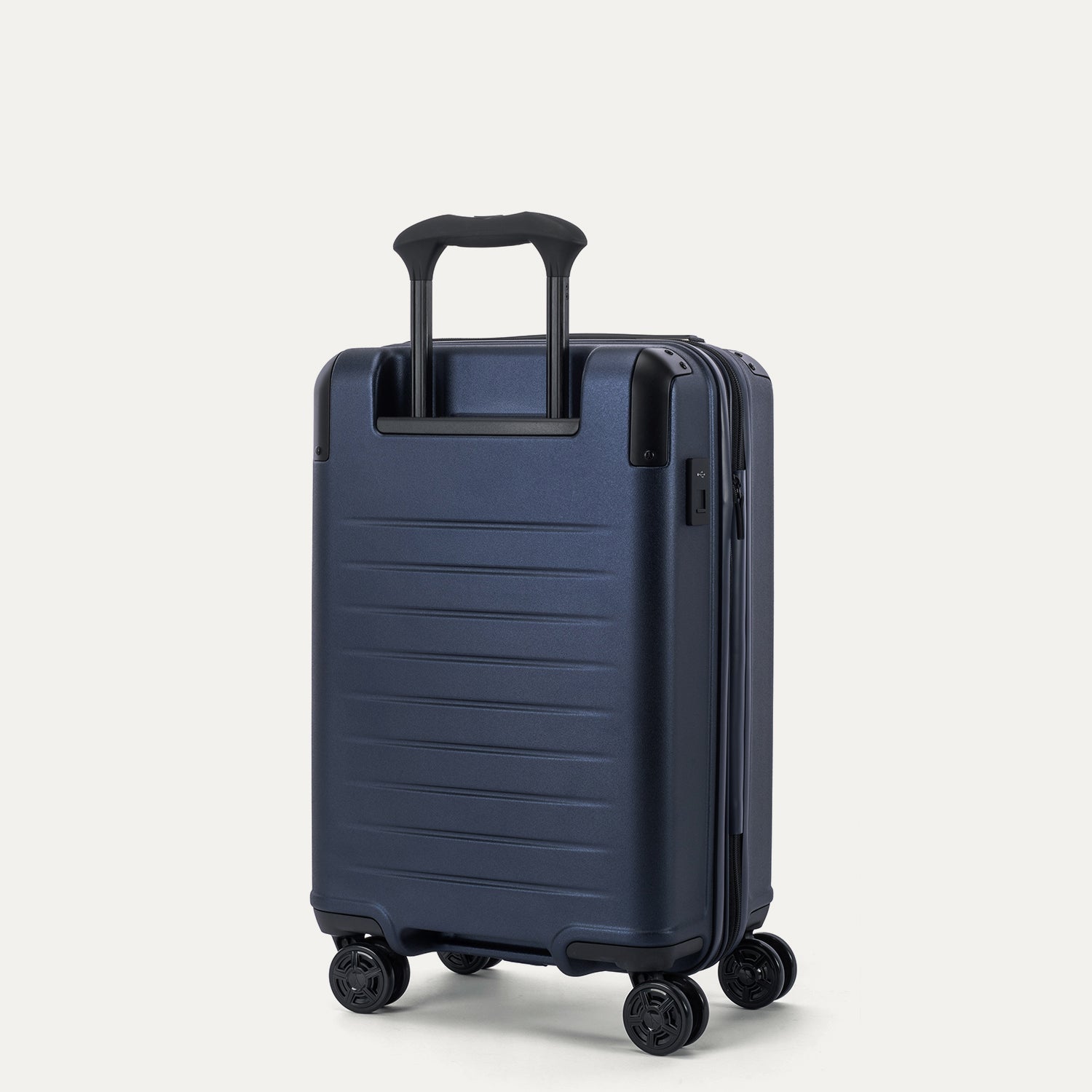 Travelpro Platinum Elite Hardside Carry-On Expandable Spinner in Aviator Navy — back view