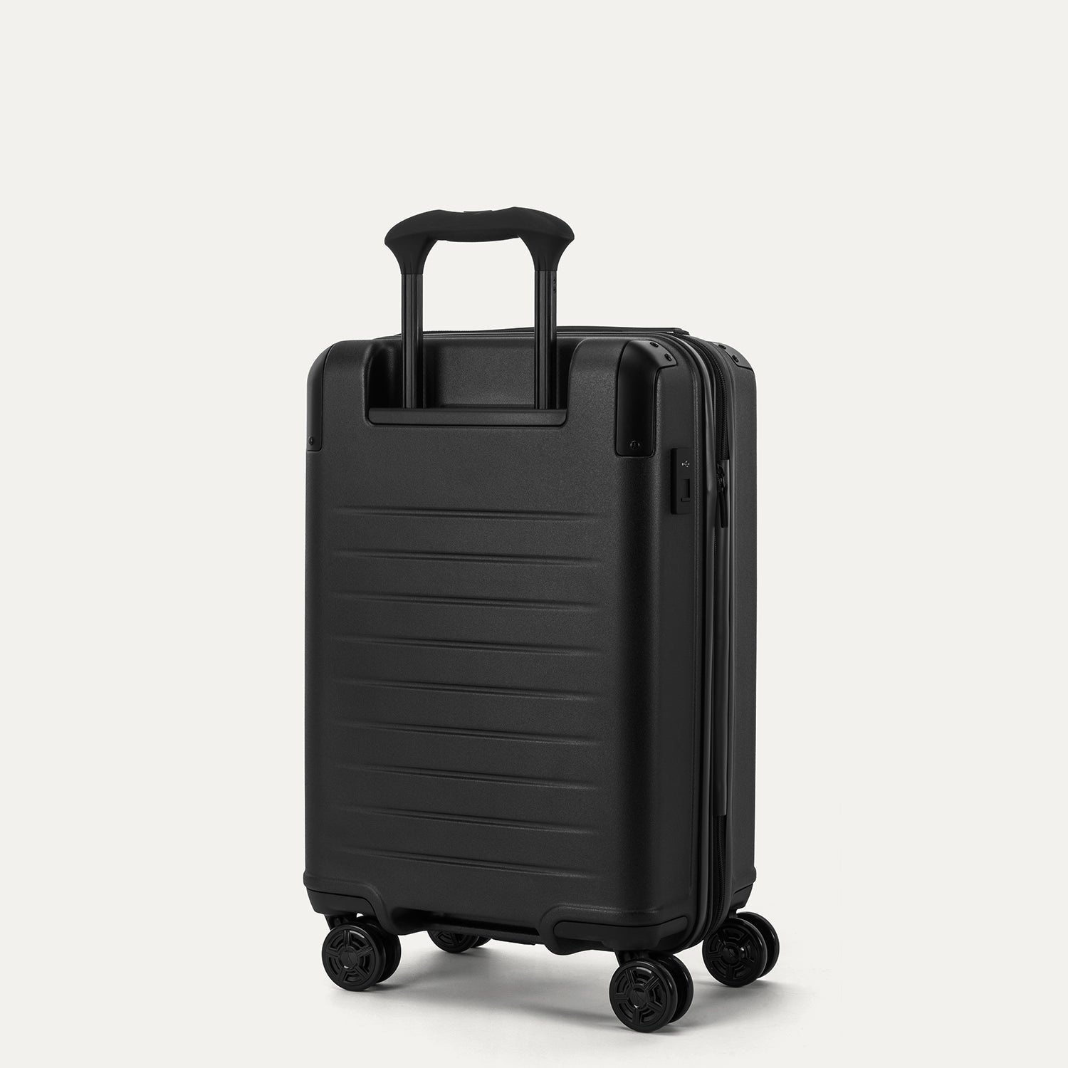 Travelpro Platinum Elite Hardside Carry-On Expandable Spinner in Jet Black — back view